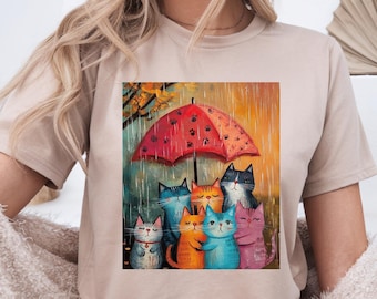 Cute Cat Umbrella Tee, Fun Gift for Cat Lovers, Cozy Short Sleeve Shirt, Perfect for Rainy Days, Animal Lovers Apparel, Birthday Gift