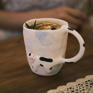 Hand-shaped and Hand-painted Ceramic Cup, Pottery Mug One of a Kind, Cat Lover Gift, Ceramic Coffee Mug, Cat Wandering with a Bird on Head.