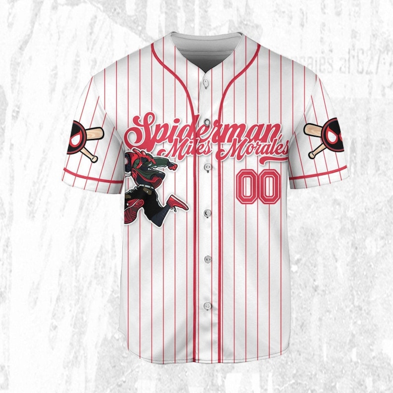 May include: White baseball jersey with red pinstripes, featuring the text "Spiderman Miles Morales" in red script. The jersey has the number "00" in red and a Spiderman graphic. Baseball bat and logo on the sleeves.