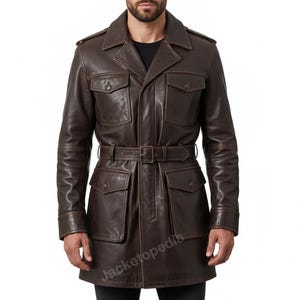 May include: A brown leather jacket with a belted waist and multiple pockets. The jacket has a classic design with a collared neckline and a button-down front. The jacket is a medium length and appears to be made of high-quality leather.