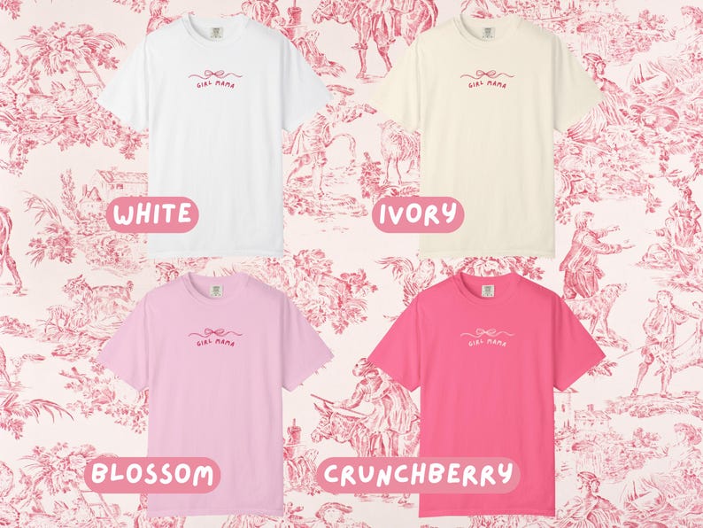 May include: Four short-sleeved t-shirts in white, ivory, blossom pink, and crunchberry pink. Each shirt has a small bow and the words "Girl Mama" printed in a cursive font. The background is a pink and white toile pattern.