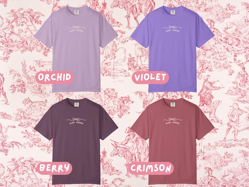 May include: Four short-sleeved t-shirts in orchid, violet, berry, and crimson. Each shirt has the text "Girl Mama" with a bow design. The shirts are displayed on a pink and white toile background.