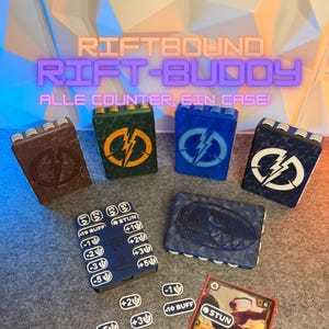 May include: A selection of Riftbound Rift-Buddy cases and counters. The cases are in shades of brown, green, and blue, each featuring a lightning bolt emblem. The counters are blue and white, with game-related text and numbers.