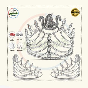 May include: A silver-toned rhinestone crown with a central design and two smaller matching crowns. The main crown features a detailed top design and cascading rhinestone strands. The image includes text and logos.