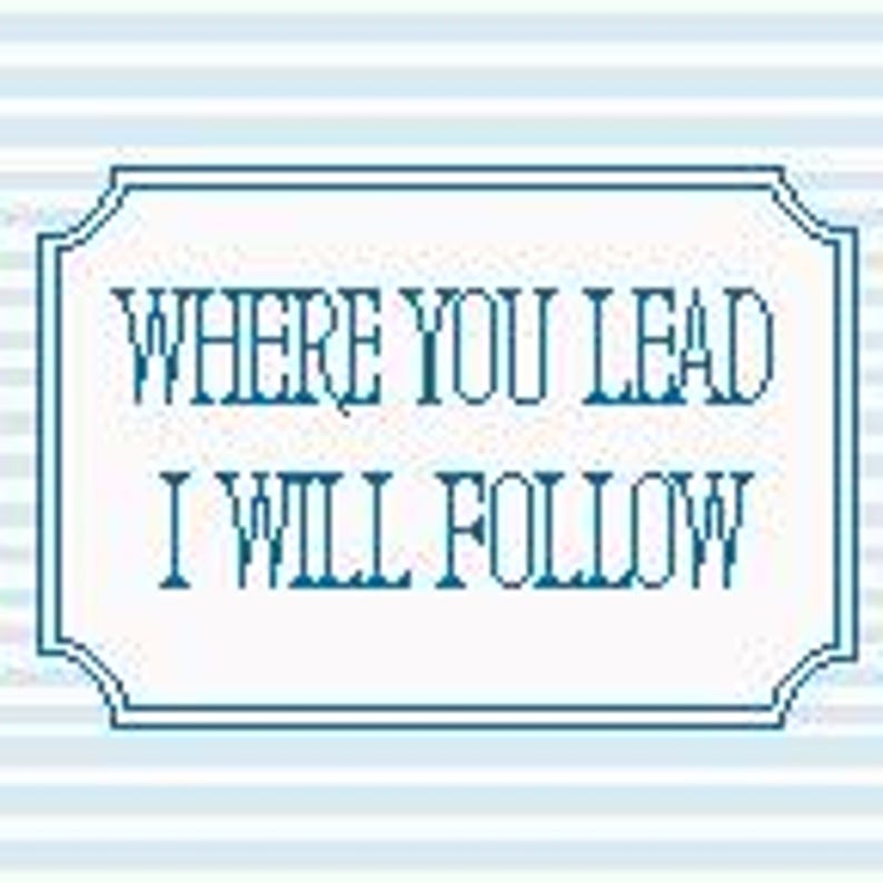 May include: A rectangular sign with the text "WHERE YOU LEAD I WILL FOLLOW" in a teal font, framed by a teal border. The background features light blue and white horizontal stripes.
