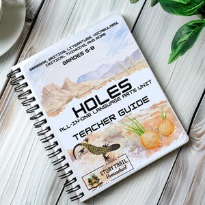 May include: A spiral-bound teacher guide titled "HOLES" for Grades 5-8, featuring grammar, writing, literature, and vocabulary. The cover displays a desert landscape, a lizard, and illustrations of onions. The guide is from Story Trail Homeschool.