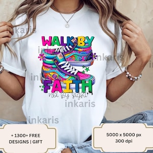 May include: White t-shirt with a colorful graphic design of sneakers and the text "WALK BY FAITH not by sight".