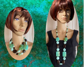 Vintage '00 - Turquoise and black flat lucite long necklace, doubles into two.