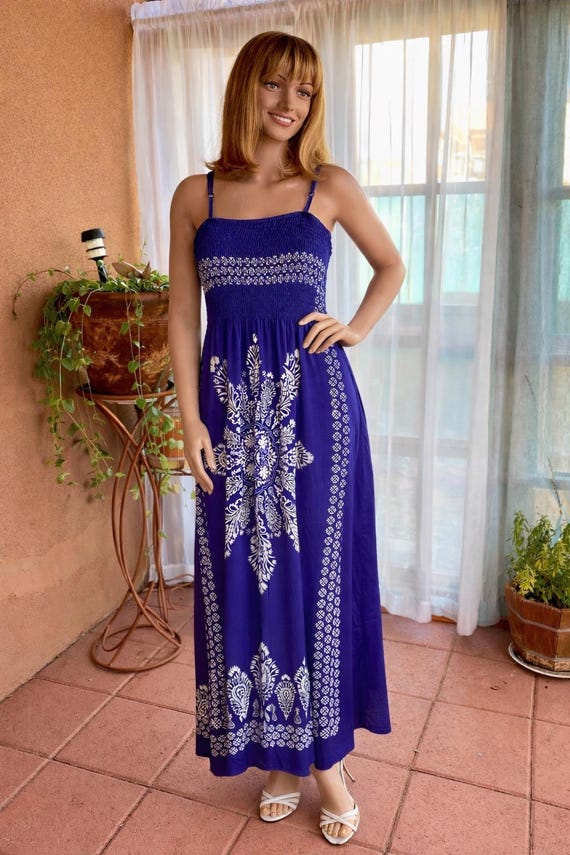 seventies maxi dress Fashion's love for the 70s is everywhere this season and we love this bold interpretation in our colourful printed dress. It is a showstopper! Shop in-store or online now at www.queenspark.com owned condition 1970s Burnt Orange Blue Retro