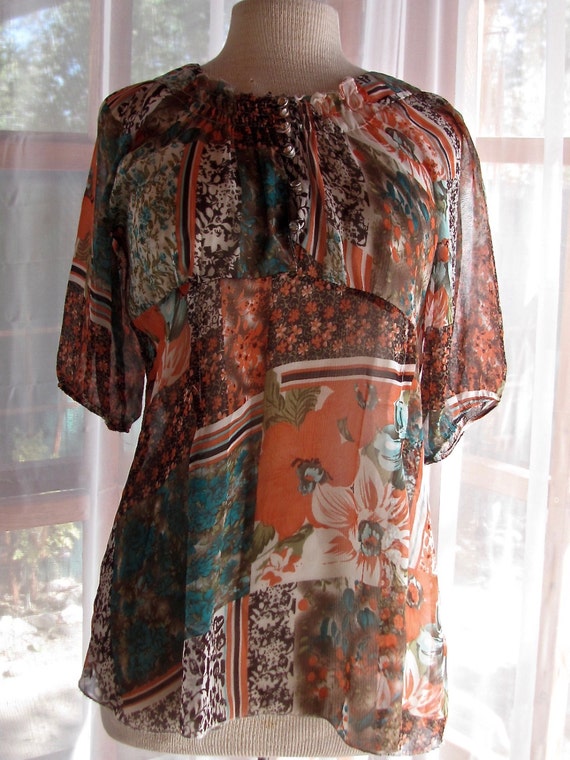 Sheer orange and turquoise blouse with front smock