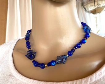 Royal blue choker -  Glass fishes necklace and assorted dangling earring with silver toggle