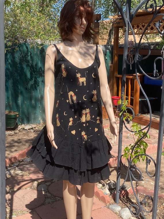 Hand painted cats dress. Black cotton with gold pa