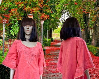 Short loose fitting cotton Kaftan, blouse, top. Tangerine color with cotton embroidery and yarn on the hems