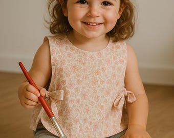 Babador de bebê artesanal em algodão com estampa floral: Forro macio em viscose e linho.