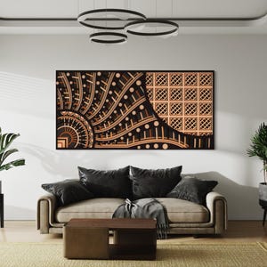 May include: A modern living room interior with a brown leather sofa, two potted plants, and a large abstract wall art piece featuring geometric patterns in black, white, and gold.