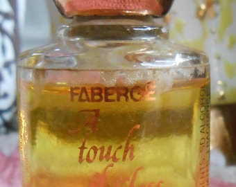 Perfume vintage FABERGE A Touch of Class, colonia de 14,8 ml (0,5 oz), minibotella redonda coleccionable.
