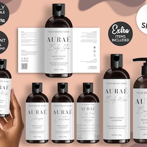 May include: An assortment of brown bottles with black lids, branded "AURAÉ" with "White Orchid & Jasmine" text. Products include body wash, shampoo, conditioner, and body lotion. The image also includes text that says "Fully Editable in Canva" and "Instant Digital Download."