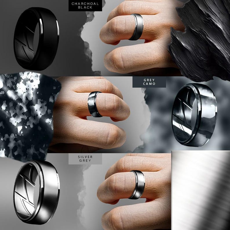 May include: Four different color variations of a black silicone ring with a silver metal band. The ring is shown on a hand wearing a camouflage pattern shirt. The colors are Charcoal Black, Grey Camo, Silver Grey, and a plain silver ring.