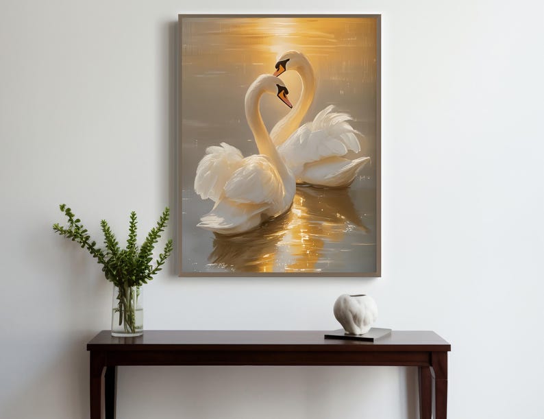 May include: Two white swans with their necks intertwined, swimming in golden sunset water. The swans are facing each other, creating a heart shape with their necks.