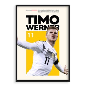 May include: A poster featuring a photo of Timo Werner, a German professional soccer player, wearing a white and black soccer jersey with the number 11 on it. The poster has a yellow background with the text "Timo Werner" and "11" in black.