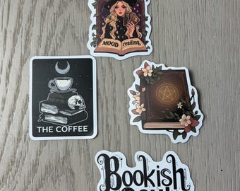 May include: Four stickers with a witch reading tarot cards, a book with a skull and a cup of coffee, a book with a pentagram and flowers, and the text "Bookish Soul".