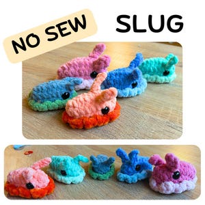 May include: A collection of small, plush, crocheted slug toys in various colours including pink, blue, teal, and orange. Each slug features two antennae and black bead eyes. The text NO SEW SLUG is displayed at the top of the image, indicating the style.