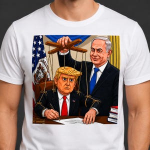 May include: A white short-sleeve t-shirt featuring a graphic illustration of a person in a suit and blue tie operating a marionette puppet of another person in a suit and red tie at a desk, with an American flag visible in the background.