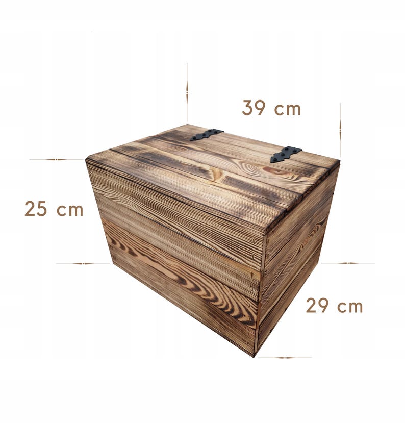 May include: A rustic wooden storage chest, 15.3 inches long, 11.4 inches wide, and 9.8 inches high. The chest is made of wood with a dark brown finish and black metal hinges. The wood grain is visible, adding to the chest's vintage appeal.