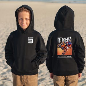 May include: Black hooded sweatshirt featuring the number 3 and the name "Eli Tomac" in white. The back of the sweatshirt displays a motocross image with the text "BEAST MODE" and "ELI TOMAC".