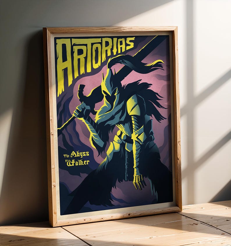 May include: Framed poster featuring a stylized illustration of Artorias the Abyss Walker. The artwork uses a limited color palette of yellow, blue, and purple. The text "Artorias" is displayed at the top, with "The Abyss Walker" below. The poster is in a wooden frame.