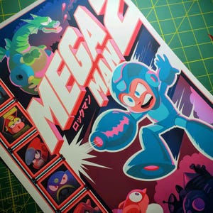 May include: A vibrant poster featuring the Mega Man video game. The artwork showcases the character in a dynamic pose, with a dragon and other characters. The title "Mega Man" is prominently displayed in large, 3D letters, with Japanese text.
