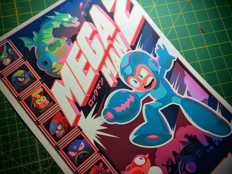 May include: A vibrant poster featuring the Mega Man video game. The artwork showcases the character in a dynamic pose, with a dragon and other characters. The title "Mega Man" is prominently displayed in large, 3D letters, with Japanese text.