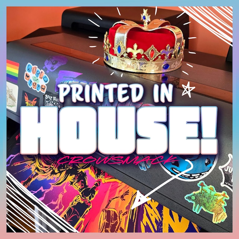 May include: A red and gold crown with blue and red jewels sits atop a printer. The text "PRINTED IN HOUSE!" is displayed in large white letters. The printer is covered in stickers.