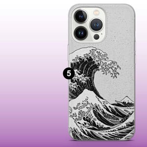 May include: A clear phone case with a black and white image of a large wave, inspired by the Great Wave off Kanagawa woodblock print. The case has a textured surface and a raised camera bump.