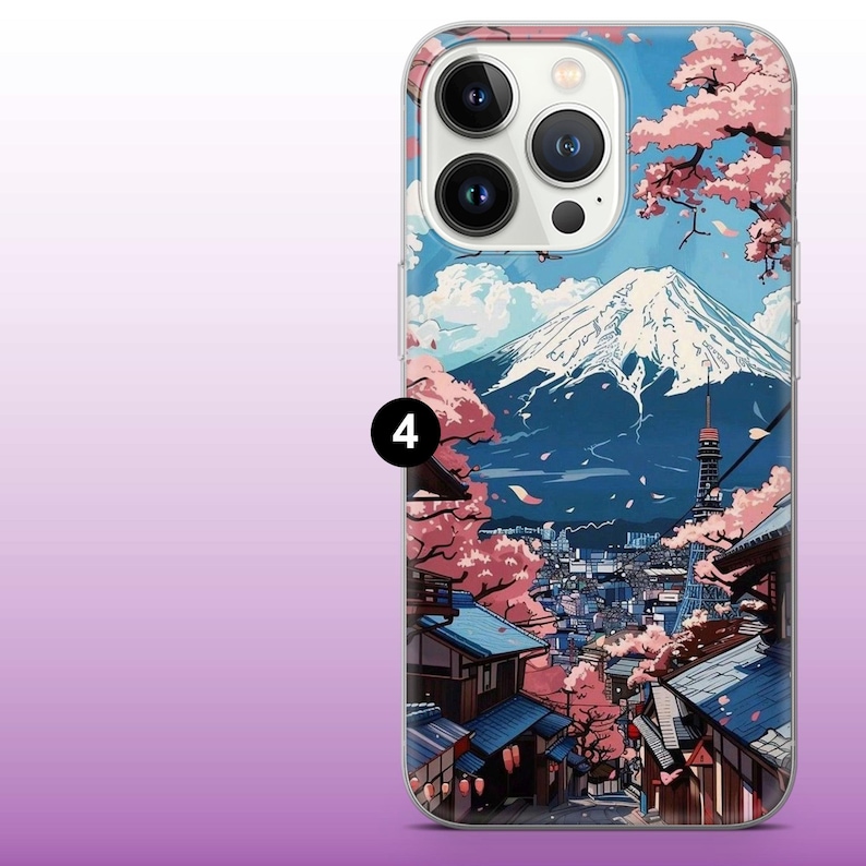 May include: A clear phone case with a colorful illustration of Mount Fuji, cherry blossoms, and a cityscape. The case features a white background with pink, blue, and green accents.