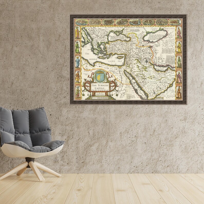 May include: A framed vintage map of the Turkish Empire, featuring detailed cartography with a brown wooden frame. The map displays geographical features and text, including "The Turkish Empire". The artwork is displayed on a concrete wall.