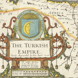 May include: A detailed, antique map of the Turkish Empire, with text that reads "The Turkish Empire. Newly Augmented by John Speed. 1626." The map features ornate scrollwork, a crest with a crescent moon, and geographical details.
