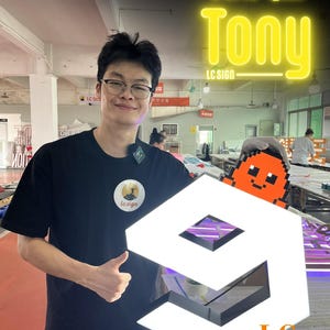 May include: A custom LED sign shaped like the number nine with a white illuminated surface and black edges. An orange pixelated character is attached to the top right corner. The sign features the text 9GAG Q&A Tony LC SIGN in yellow.