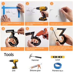 May include: Step-by-step guide for installing a black illuminated house number. The process includes using a drill, silicone glue, and painter's tape. The number is attached to the wall with screws.