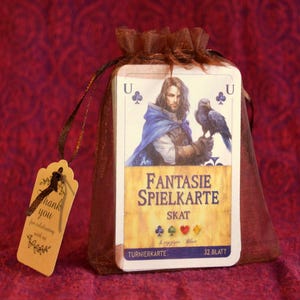 Fantasie-Spielkarte im Geschenkbeutel