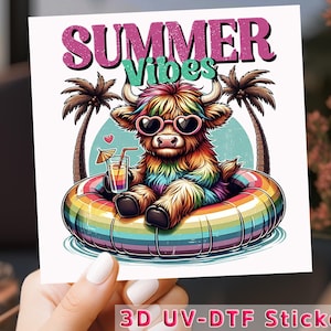 May include: A colorful sticker featuring a cartoon Highland cow wearing heart-shaped sunglasses and floating in a rainbow inner tube. The cow is holding a drink with a tiny umbrella. The words "SUMMER Vibes" are at the top.