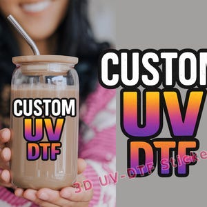 May include: A clear glass tumbler with a brown liquid inside. The tumbler has a straw and a lid. The tumbler has a sticker on it that says "Custom UV DTF".