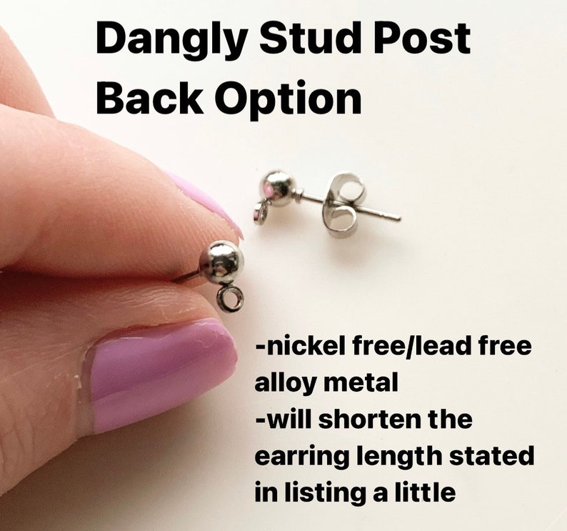 May include: Close-up of a pair of silver dangle earring posts. The posts are nickel and lead free. The text "Dangly Stud Post Back Option" is at the top of the image. The text "nickel free/lead free alloy metal" and "will shorten the earring length stated in listing a little" is at the bottom of the image.