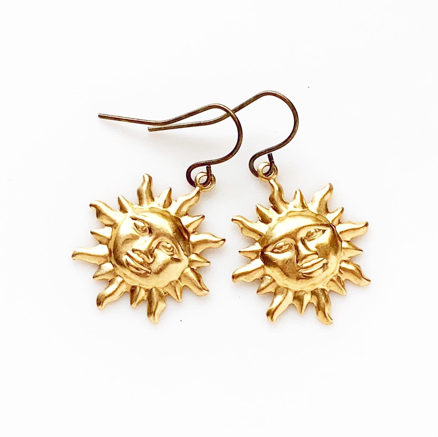 Sun face earrings deals