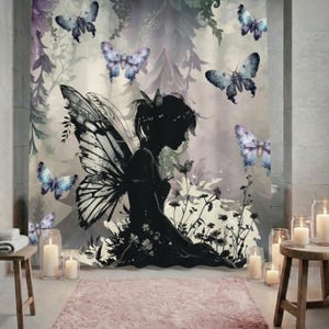 May include: A shower curtain featuring a black silhouette of a fairy with butterfly wings, surrounded by butterflies in shades of blue and purple. The background depicts a forest scene with floral elements. The overall design has a whimsical and fantasy theme.