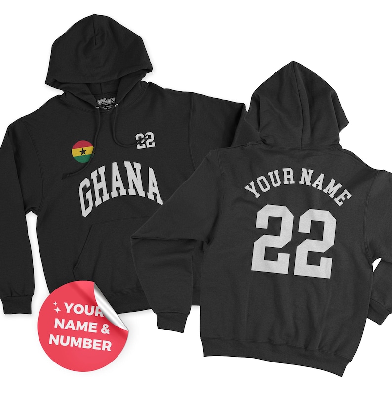 May include: Black hooded sweatshirt with the word "GHANA" in white block letters, the number "22", and a Ghana flag emblem. The back of the sweatshirt has the text "YOUR NAME" above the number "22".
