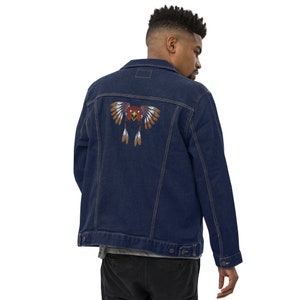 May include: A dark blue denim jacket with a colourful embroidered eagle design on the back.