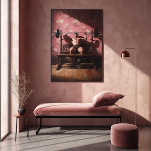 May include: A framed artwork shows a weightlifter bench pressing. The artwork is mounted on a pink wall above a pink velvet bench with a black metal frame. A small side table and a floor lamp are also in the room.