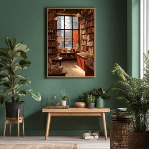 A framed illustration of a bookstore with autumn trees outside, hanging on a dark green wall with several potted plants on the floor.