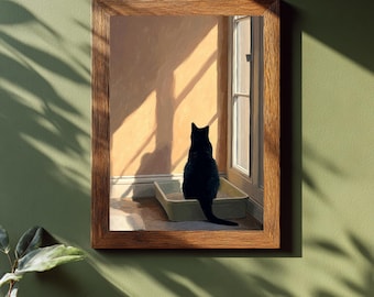Puede incluir: Una obra de arte enmarcada representa un gato negro sentado en una caja de arena junto a una ventana, mirando hacia afuera. La habitación está bañada por la luz del sol, con sombras en la pared. El marco es de madera, sobre un fondo verde apagado.